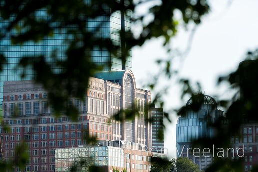 500 Boylston Street in Boston's Back Bay seen from the Boston Common through tree branches